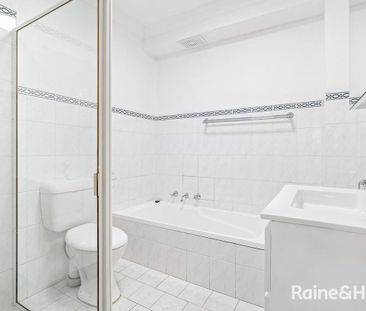 Renovated Top Floor Apartment with Space, Sun & Convenience - Photo 6