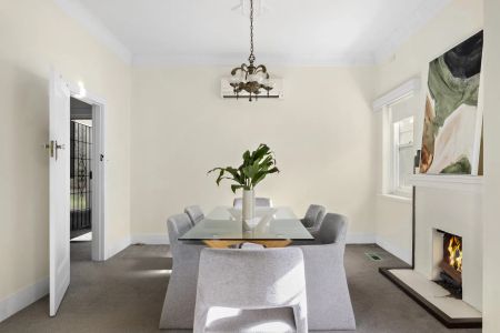 Family-Sized Art Deco Classic on a Prime Corner offering Comfort & Character - Photo 5