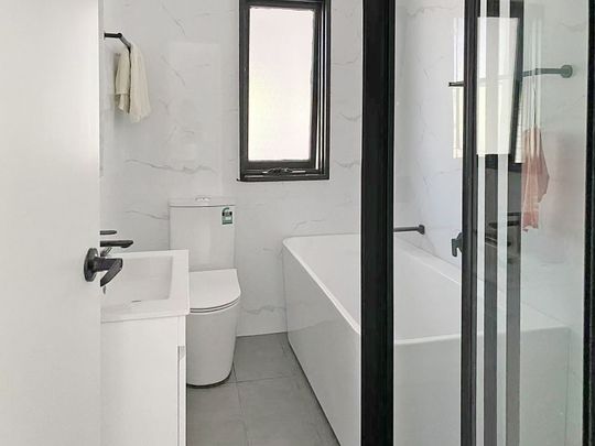 BEAUTIFULLY RENOVATED 4 BEDROOM HOME - Photo 1