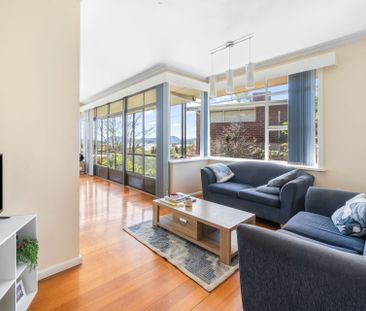Spacious 3-Bedroom Unit with Water Views in Sandy Bay - Photo 2