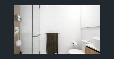 Elegant 1-Bedroom Retreat with Sweeping Cityscapes - Photo 4