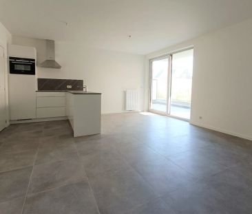 RECENT GELIJKVLOERS APPARTEMENT MET GROOT TERRAS EN AUTOSTAANPLAATS - Photo 4