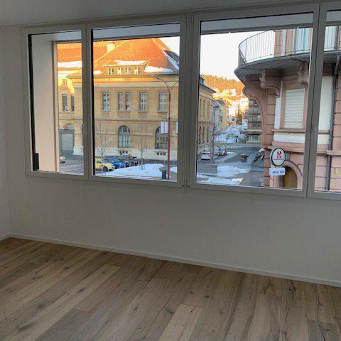 APPARTEMENT AVEC ENCADREMENT - Place de la Gare 4a, appartement de 2.5 pièces - Photo 1