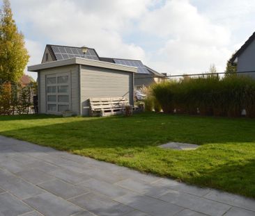 Verzorgde halfopen gezinswoning met drie slaapkamers en mooie tuin - Photo 4