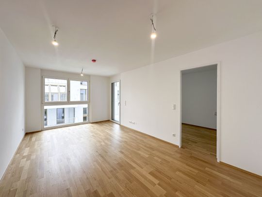 Helle 2 Zimmer Wohnung mit Balkon - ERSTBEZUG - Foto 1