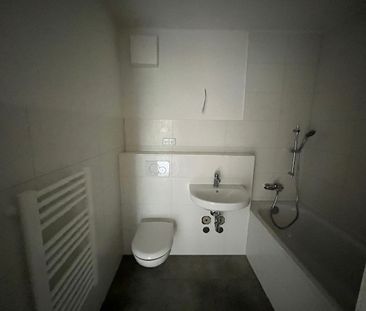 Sanierte 2 Raumwohnung mit Badewanne und Balkon - Foto 1