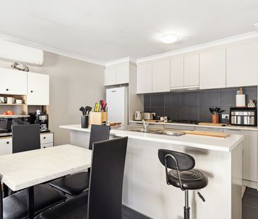 MODERN TOWNHOUSE LIVING IN PRIVATE COMPLEX - Photo 1