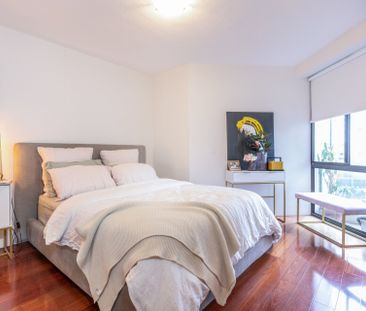 A light & spacious apartment w/ balcony & urban city views | Centra... - Photo 5