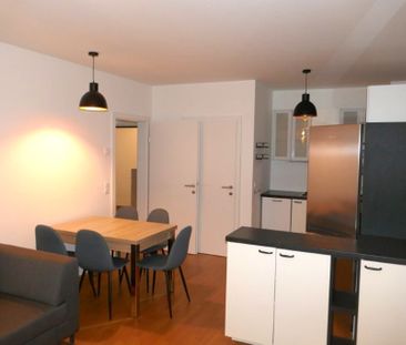 Neuwertige Mietwohnung mit Loggia und Tiefgaragen-Stellplatz in 270... - Foto 1
