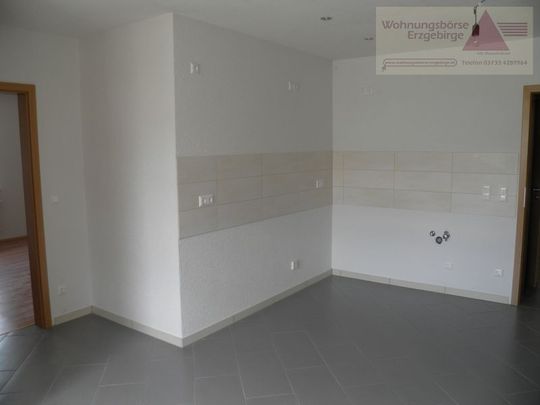 Schicke 2-Zimmer-Wohnung im Zentrum von Olbernhau! - Photo 1