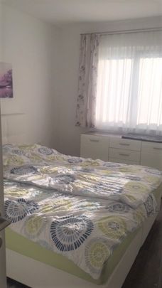 Moderne, Top Gepflegte 2 Zimmer Wohnung mit Terrasse und Garten in zentraler Lage - Photo 1