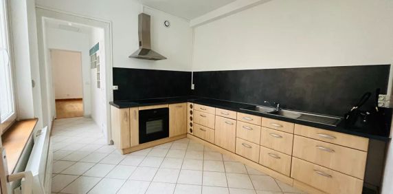 A LOUER APPARTEMENT EN RDC PROCHE CENTRE VILLE DE ST QUENTIN 02100 - Photo 2