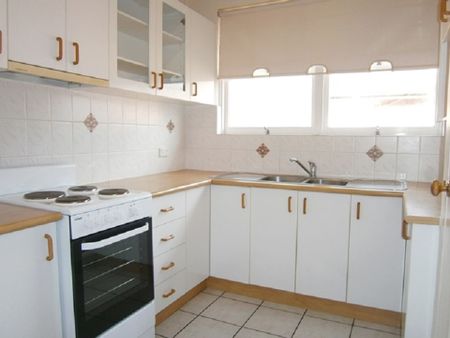 Two Bedroom Unit with Lock up Garage - Photo 4