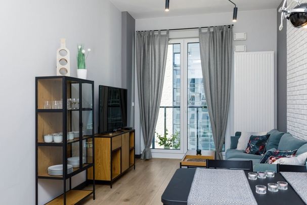 Nowoczesne z balkonem i miejscem w garażu 61.9 m² - Photo 1