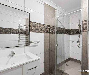 Stylishly Renovated Home with Sunroom Retreat - Photo 4