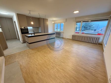 MAGNIFIQUE APPARTEMENT RÉNOVÉ DE 3,5 PIÈCES AVEC GRAND BALCON - Photo 2