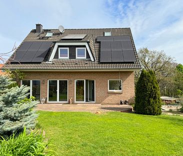 Freistehendes Haus mit Einliegerwohnung, Garage, Kamin & schönem Süd-Garten in familiärer Lage - Foto 2