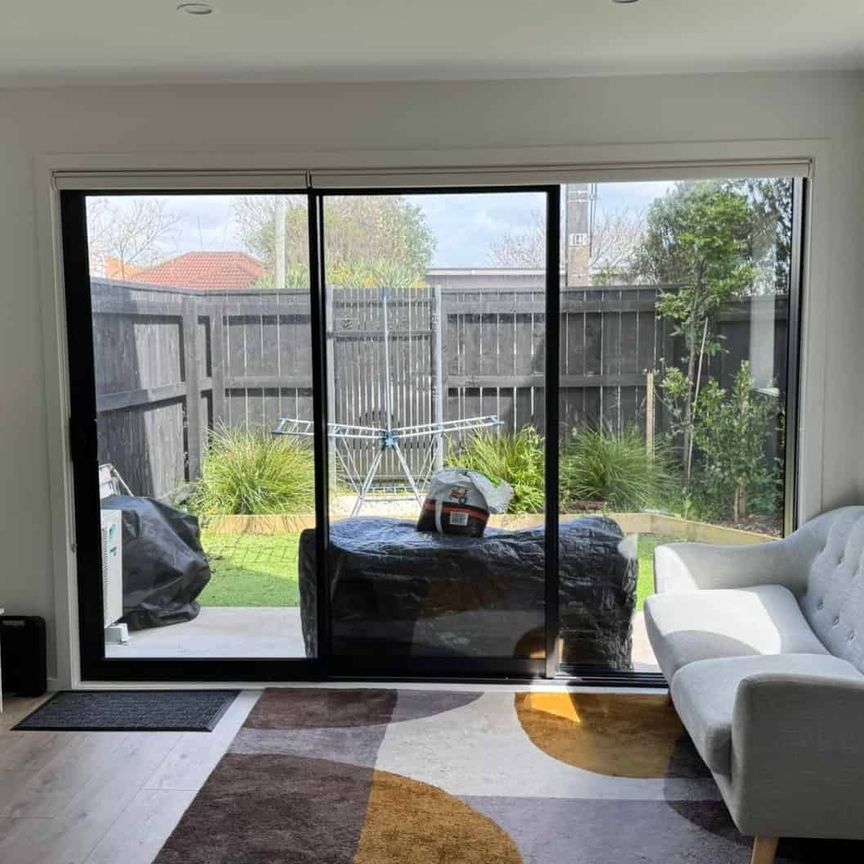 Modern, Sunny, Private and Fully Fenced Townhouse - Photo 1