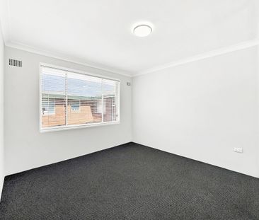 Renovated Two-Bedroom Apartment in Convenient Location - Photo 5