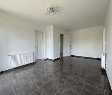 Location appartement 4 pièces 68.57 m² à Romans-sur-Isère (26100) - Photo 1