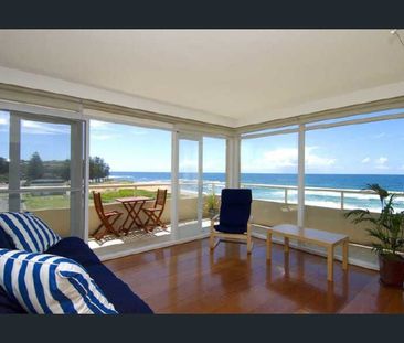 Top Floor Coastal Apartment with Panoramic Ocean Views - Photo 1