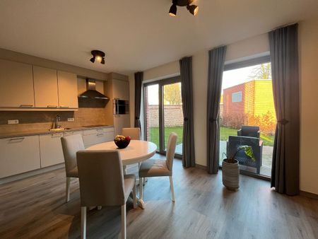 Gelijkvloers appartement met 2 slaapkamers en tuin - Foto 4