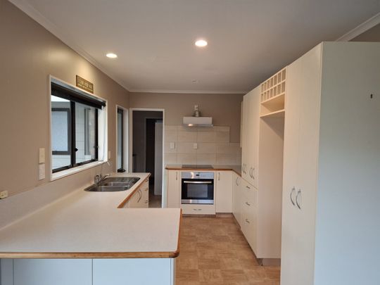 This fantastic family home offers a generous open-plan living on the ground floor, seamlessly flowing out to a rear patio and fully fenced yard—perfect for entertaining or relaxing with family. - Photo 1