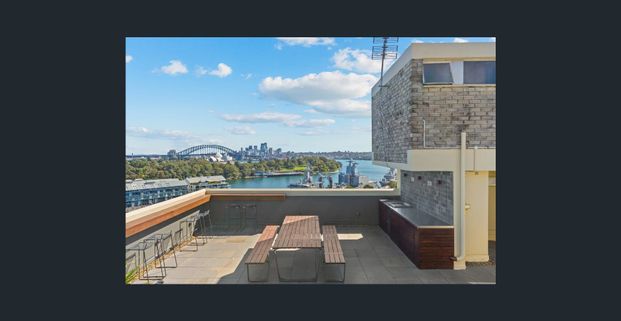 Renovated Mid-Century Apartment With Resort-Style Rooftop & Easy Village Access - Photo 1