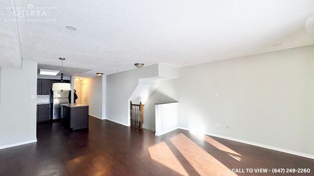 STUNNING 2-BEDROOM CONDO-TOWNHOUSE WITH BEAUTIFUL UPGRADES - Photo 1