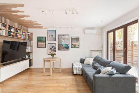 Przytulne, dwupoziomowe mieszkanie z ogródkiem - Zdjęcie 3