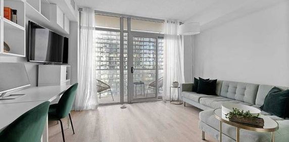 Condo Rental - Stylish 1 Bed, 1 Bath with Balcony, City & Water Views - Photo 2