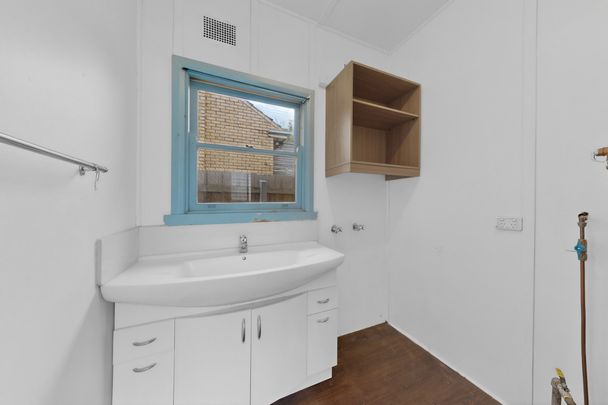 FAMILY HOME WITHIN SCHOOL ZONE - Photo 1