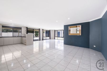 Large Family Home with Side Access, Big Backyard and Powered Workshop - Photo 3