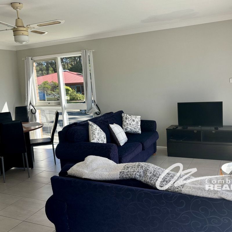 Upstairs 2-Bedroom Unit with Large Balcony – Close to Huskisson Waterfront & Main Street, Including utilities and Lawn Maintenance - Photo 1