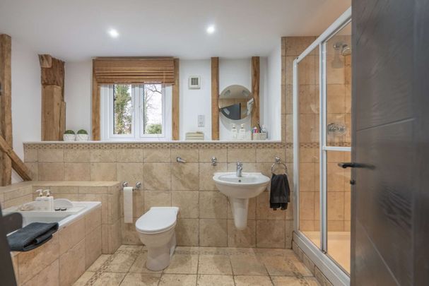 A high specification four-bedroom Barn conversion with additional one bedroom apartment. - Photo 1