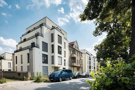 Wundersch&ouml;ne Erdgeschosswohnung mit toller EBK &amp; gem&uuml;tlichem Balkon im gr&uuml;nen Buch - Foto 2