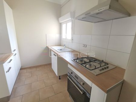 Location Appartement 2 pièces 49m² NIMES 30000 - Photo 2
