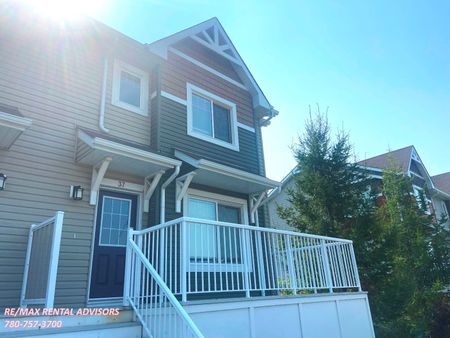 SPACIOUS 3 BED, 2.5 BATH, TOWNHOUSE WITH DOUBLE ATTACHED GARAGE IN THE COMMUNITY OF TAMARACK - Photo 4
