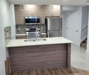 1-bedroom basement with side entrance, AC, Legal kitchen, Laundry i... - Photo 1