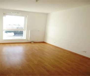 Location Appartement 3 pièces 73m² - Photo 3