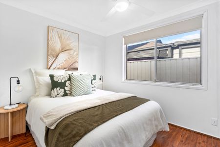 RENOVATED AND READY TO MOVE IN Three Bedroom Residence Close to All Amenities! - Photo 4