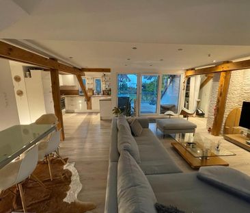 Exklusive Dachgeschosswohnung in zentraler Lage - Foto 1