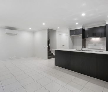 Spacious Townhouse Available Now! - Photo 1
