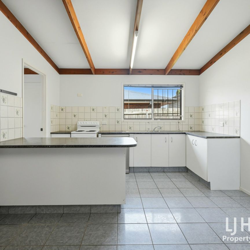 Spacious four bedroom home in convenient location - Photo 1