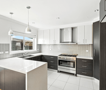 Modern Family Home with Basement Parking - Photo 5