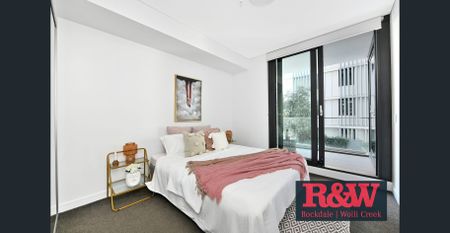 Modern 1-Bedroom Apartment in the Heart of Discovery Point - Photo 3