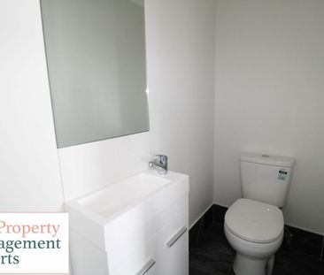 Spacious Four-Bedroom Family Home in a Prime Location! - Photo 2