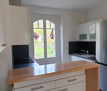 Spacieux appartement de 4 pièces au rez-de-chaussée surélevé - Photo 2