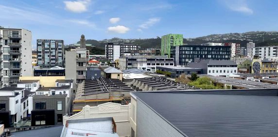 CENTRAL CITY APARTMENT LIVING - Photo 2