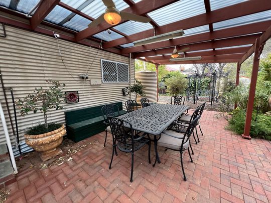 Across from the Hospital - Furnished - Photo 1